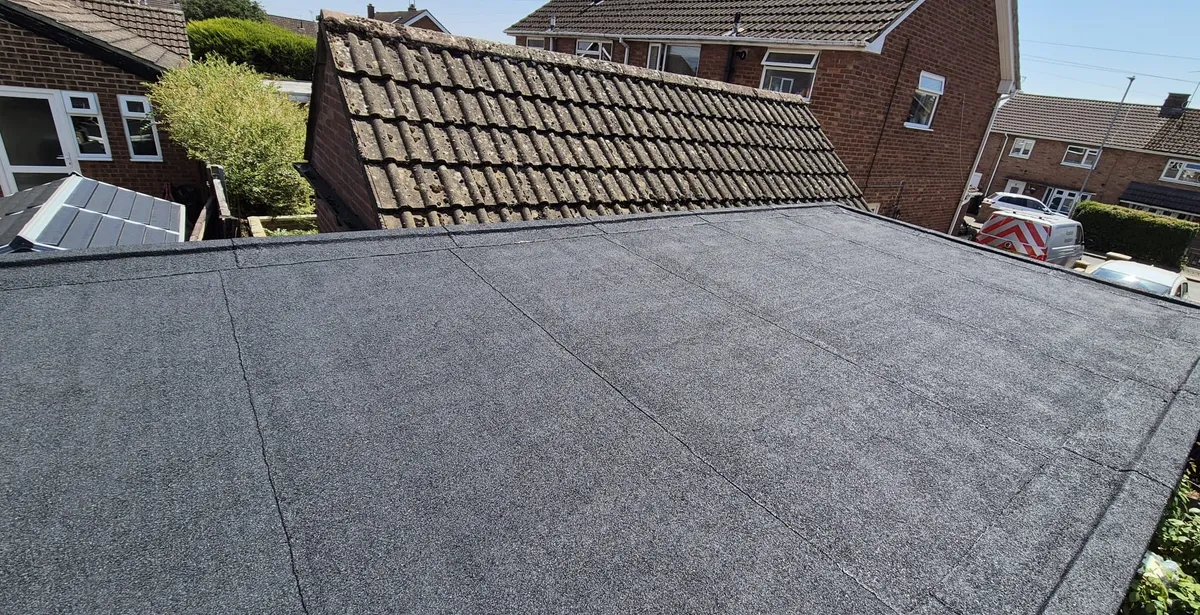 A garage roof, newly felted